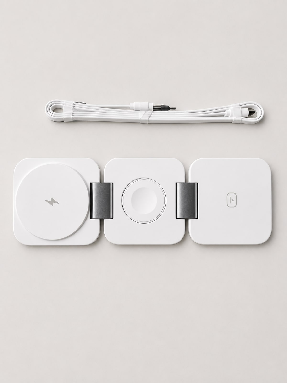 TRIPL laid flat with its three charging pads in a row