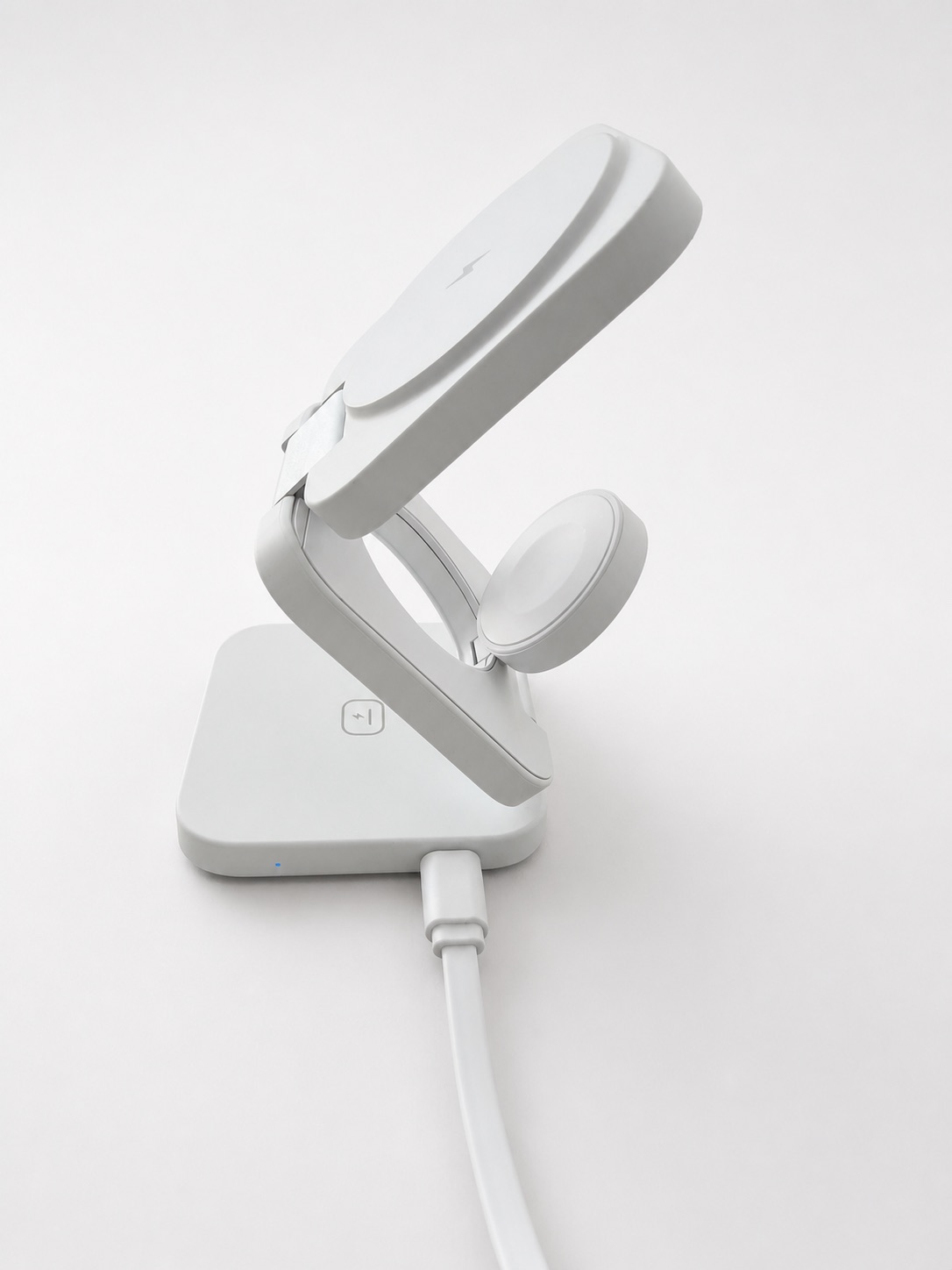 TRIPL charger in standby mode with a tiny cool blue status light on the front edge
